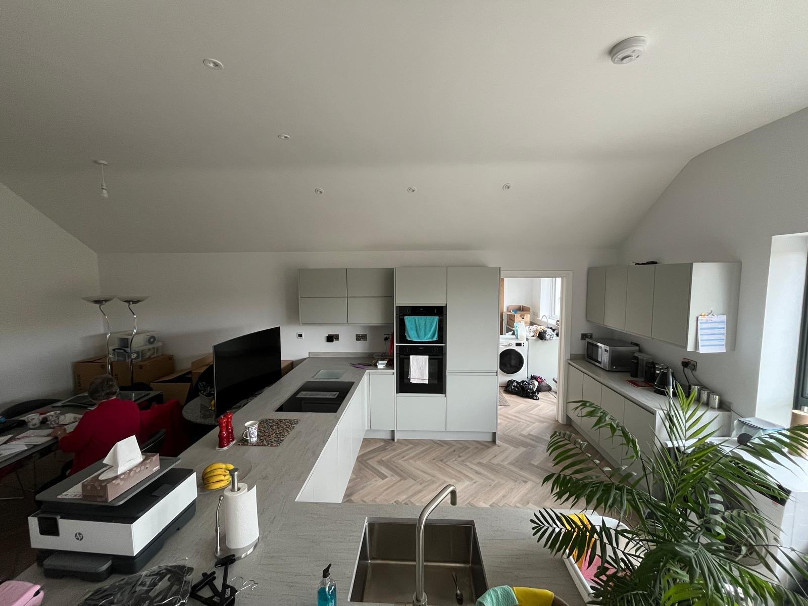 Open-plan kitchen before the work